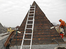 Workers Repairing Roof